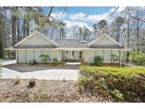Charming single story home with a large front yard and ample parking space at 4859 Clark Lake Nw Way, Acworth, GA 30102