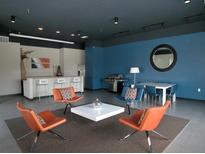 Modern lounge area with stylish seating, kitchen bar, and dining area for relaxing and entertaining at 333 Nelson Sw St # 214, Atlanta, GA 30313