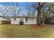 Charming single-story home with a well-maintained front yard and inviting entrance at 3169 Bluebird Ln, Decatur, GA 30032