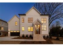 Elegant home with a modern farmhouse style and large windows for natural light at 581 Sherwood Ne Rd, Atlanta, GA 30324