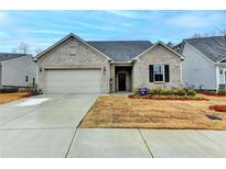 Charming single-story home with a well-manicured lawn and a two-car garage, offering comfortable suburban living at 811 Pineberry Ct, Grayson, GA 30017