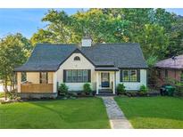 Charming single-Gathering home with beautiful lawn, walkway and front porch at 2702 Wedgewood Ter, Decatur, GA 30032