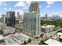Stunning aerial view of the high-rise apartment and the surrounding city skyline at 361 17Th Nw St # 1717, Atlanta, GA 30363