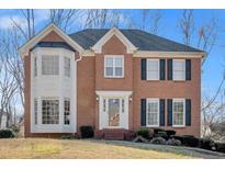 Beautiful brick home with bay window and manicured landscaping at 4508 Ashmore Circle Cir, Marietta, GA 30066
