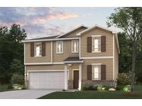 Charming two-story home featuring neutral siding, decorative shutters, and an attached two-car garage at 5523 Rosehall Pl, Atlanta, GA 30349
