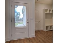 Mudroom features a storage bench and convenient access to the outside at 71 Malcom Rd, Covington, GA 30014