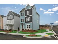 Attractive two-story home with blue and gray siding, white trim, and a well-maintained lawn at 512 Aberdeen Meadow Ln, Acworth, GA 30102