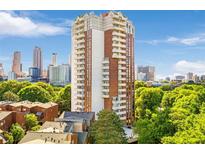 A high-rise condominium featuring multiple balconies and a view of the Atlanta skyline at 375 Ralph Mcgill Ne Blvd # 804, Atlanta, GA 30312
