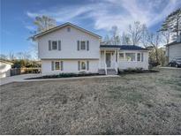 Charming two-story home with a well-maintained yard and classic architectural details at 43 Landmark Sw Ln, Marietta, GA 30060