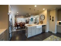 Bright eat-in kitchen with stainless steel appliances and a large island is great for entertaining at 2400 Edgar Park Pl # 103, Duluth, GA 30096