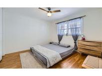 Bright bedroom featuring hardwood floors, a ceiling fan, and soft natural light at 1284 Piedmont Ne Ave # 12, Atlanta, GA 30309
