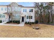 Charming two-story home with landscaped yard and inviting front porch at 1286 Brookins Trl, Atlanta, GA 30316