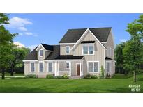 Charming two-story home with board and batten siding, a covered porch, and beautifully landscaped front yard at 4060 Andover Cir, Mcdonough, GA 30252