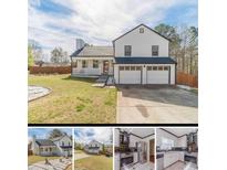 Charming home with a two-car garage, front porch, and manicured lawn at 785 Josh Ln, Lawrenceville, GA 30045