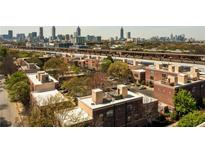 Stunning brick apartment complex with cityscape views provides a contemporary and convenient urban lifestyle at 791 Wylie Se St # 105, Atlanta, GA 30316