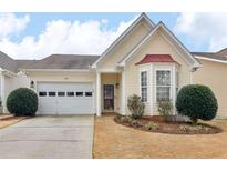 Charming single-story home features a manicured front lawn, attached garage, and inviting front entrance at 740 Azalea Ave, Mcdonough, GA 30253