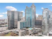This high rise condo boasts city views and an outdoor rooftop pool in the heart of downtown Atlanta at 400 W Peachtree Nw St # 1408, Atlanta, GA 30308