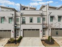 Charming townhome with a two-car garage and modern architectural details at 2712 Stargazer Ter, Smyrna, GA 30080