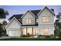 Charming two-story home with white siding, black roof, wooden pillars, and a well-manicured lawn at 292 Rockledge Sw Bnd, Powder Springs, GA 30127