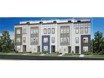 Modern townhome exteriors feature stylish siding, colorful accents, and well-manicured landscaping at 502 Motivation Nw Cir # 0009, Atlanta, GA 30309