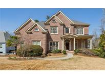 Charming two-story brick home with manicured landscaping at 2298 Greenglade Ne Rd, Atlanta, GA 30345