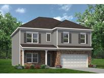 New two-story home showcasing brick and gray siding, complemented by a well-manicured lawn and lush landscaping at 525 Lanier Way, Temple, GA 30179