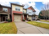 Charming townhomes with attached garages and manicured lawns in a desirable neighborhood at 4116 Mars Bay # 27, Acworth, GA 30101