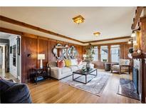 Cozy living room features hardwood floors, fireplace, and natural lighting at 1666 Johnson Ne Rd, Atlanta, GA 30306