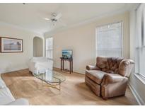 Bright living room featuring wood floors, natural light, and comfortable seating at 3777 Peachtree Ne Rd # 1007, Atlanta, GA 30319