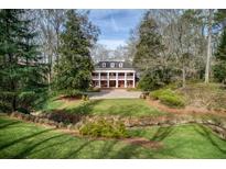 Beautiful two-story home with mature landscaping at 0 Winterthur, Sandy Springs, GA 30328