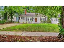 Charming one-story home with a well-maintained lawn and traditional architectural details at 1132 Fair St, Atlanta, GA 30314
