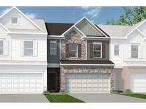 Charming townhome showcasing a stone facade and a two-car garage for added curb appeal at 206 Bastian Dr # 107, Villa Rica, GA 30180