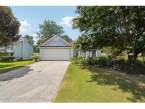 Charming one-story home with a well-manicured lawn and inviting curb appeal at 3861 Rivers Run Nw Trce, Acworth, GA 30101