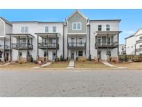 New townhomes feature balconies, neutral colors, and landscaping at 2219 Nena Way # 22, Tucker, GA 30084
