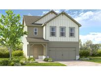 Charming two-story home features a covered porch, a two car garage, and a well maintained lawn at 234 Groveton Ct, Euharlee, GA 30145