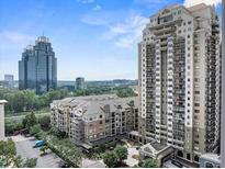 High-rise condo building with modern architecture and beautiful city views at 795 Hammond Dr # 1108, Atlanta, GA 30328
