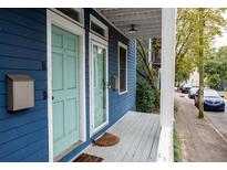 Charming blue home with a covered porch, mailbox and street view at 206 Reinhardt St Se, Atlanta, GA 30312