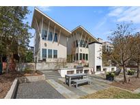 Modern home with outdoor kitchen, built in grill and a fireplace perfect for entertaining at 155 Breakspear Ln, Fayetteville, GA 30214