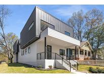 Striking modern exterior with two-story design, clean lines, and inviting front porch at 1926 Trotti Ne St, Atlanta, GA 30317