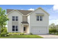 Charming two-story home with white siding, a two-car garage, and a welcoming front porch at 236 Groveton Ct, Euharlee, GA 30145