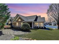 Charming single-story home with stone accents, manicured landscaping, and a welcoming front entrance at 1535 Duluth Hwy # 1001, Lawrenceville, GA 30043