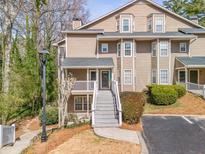 Inviting townhouse with neat landscaping and a covered porch at 2131 N Forest Trl, Atlanta, GA 30338