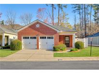 Charming brick home with a well-manicured lawn and a two-car garage, in a desirable neighborhood at 4071 Cottage Oaks Dr # 3, Acworth, GA 30101