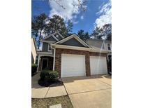 Charming two-story home featuring a two-car garage and stone accents at 108 Creekwood Trl, Acworth, GA 30102