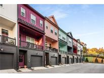 Colorful townhome exteriors show unique architectural design and curb appeal in residential community at 160 Color Cir, Atlanta, GA 30317