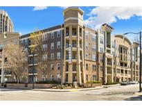 Beautiful condo exterior with large balconies and a building sign at 390 17Th Nw St # 5031, Atlanta, GA 30363