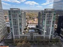 Stunning high-rise condo with luxurious amenities including a sparkling pool and beautiful city views at 923 Peachtree Ne St # 930, Atlanta, GA 30309