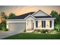 Charming one-story home with gray siding, blue shutters, well-manicured lawn and a two-car garage at 871 Pineberry Ct, Grayson, GA 30017
