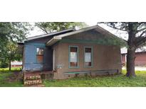 Exterior view of a home with an unkempt front yard needing renovation at 868 Oakhill Sw Ave, Atlanta, GA 30310