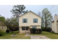 Charming two-story home with a cozy front porch and neatly maintained lawn at 359 Fourth St, Forest Park, GA 30297